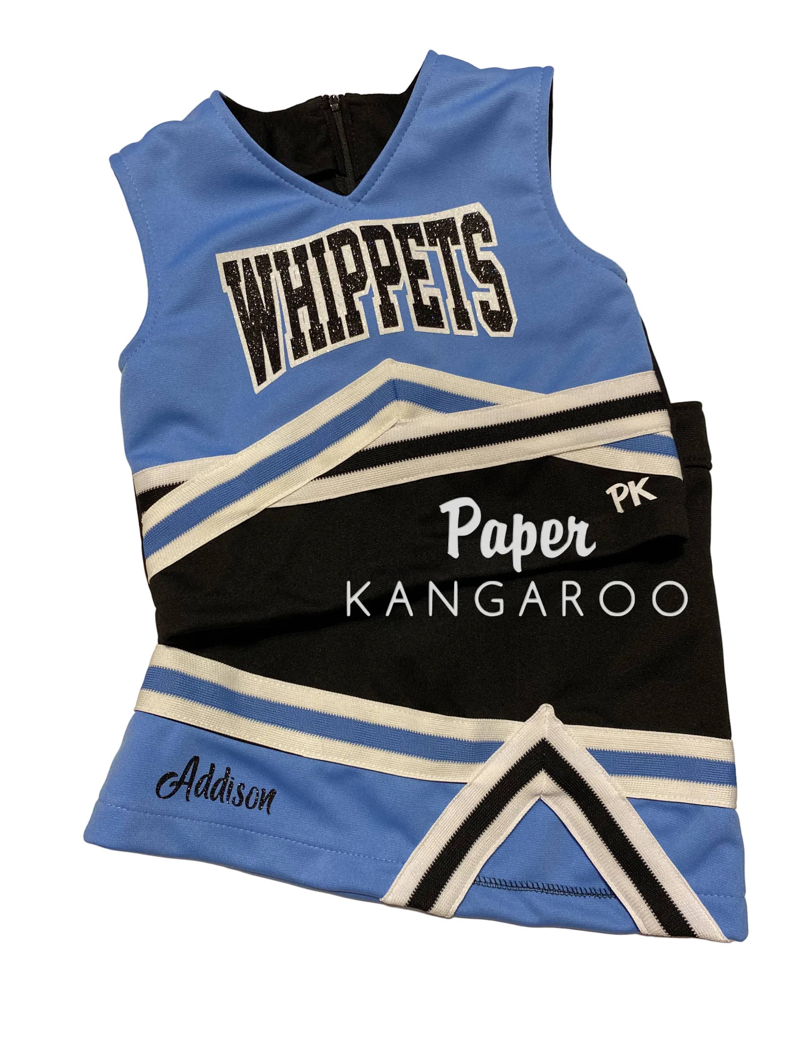 A custom cheerleader-style sleeveless jersey laid flat on a light beige surface. The jersey is light blue and black with white stripes and lettering.