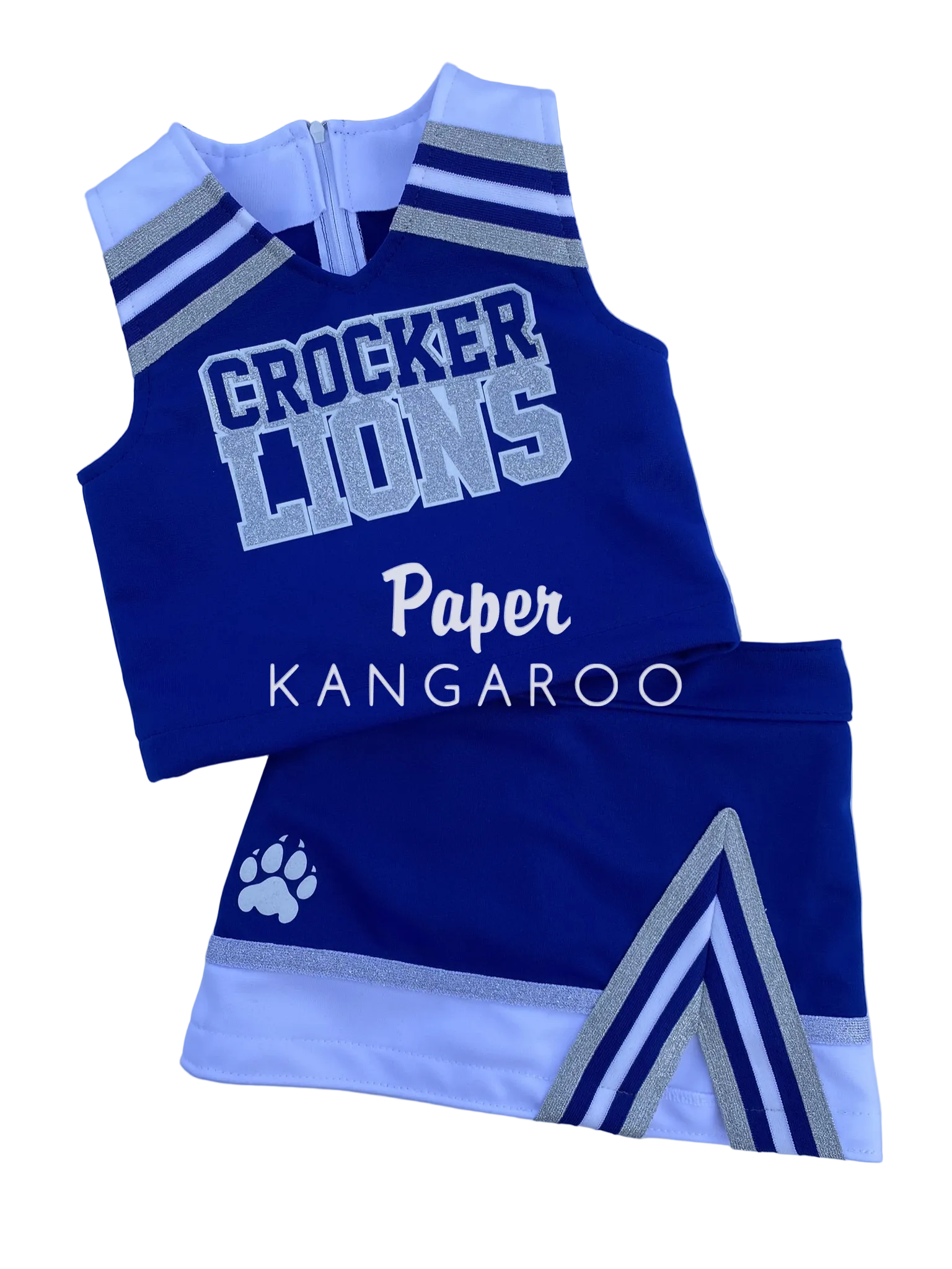 A custom cheerleader outfit set consisting of a sleeveless top and matching shorts in royal blue, white, and silver. The top features 'CROCKER LIONS' printed on the front, and the shorts display a white paw print logo.