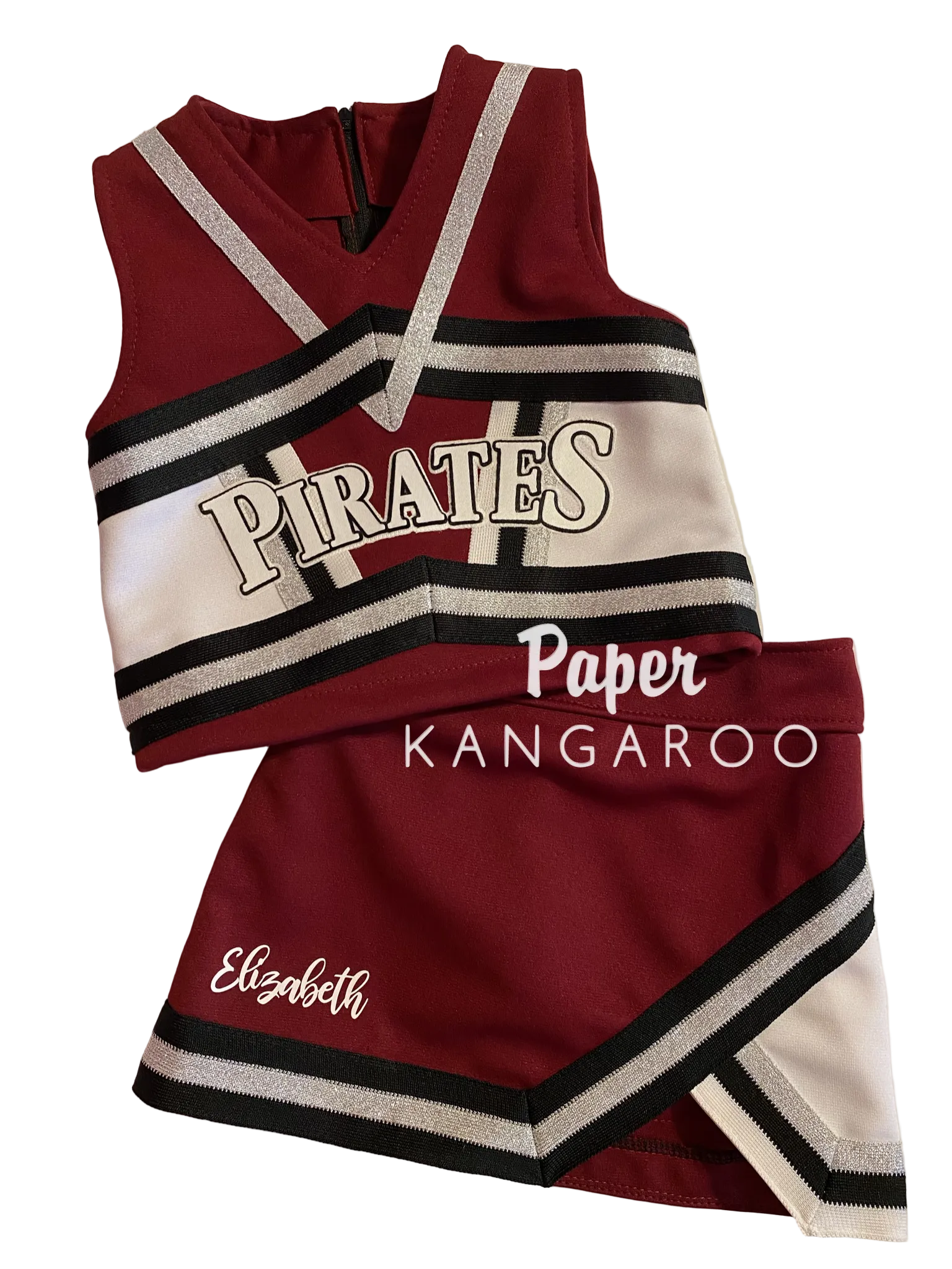 A two-piece cheerleader outfit set consisting of a sleeveless top and a matching skirt, featuring a burgundy, white, and black color scheme with silver glitter trim. The top has 'PIRATES' printed across the chest, and the skirt has 'Elizabeth' embroidered on the side.