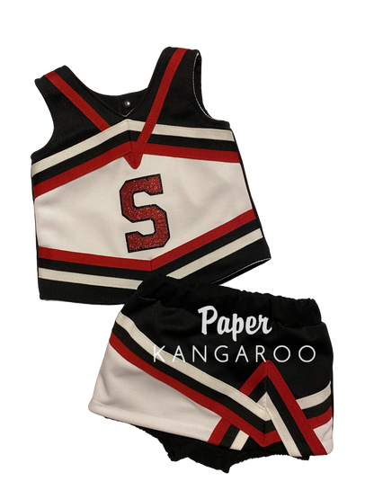 A two-piece cheerleader outfit set consisting of a sleeveless top and matching shorts, featuring a black, white, and red color scheme with a glittery red letter 'S' on the top. The shorts have a black and white chevron pattern with red accents.