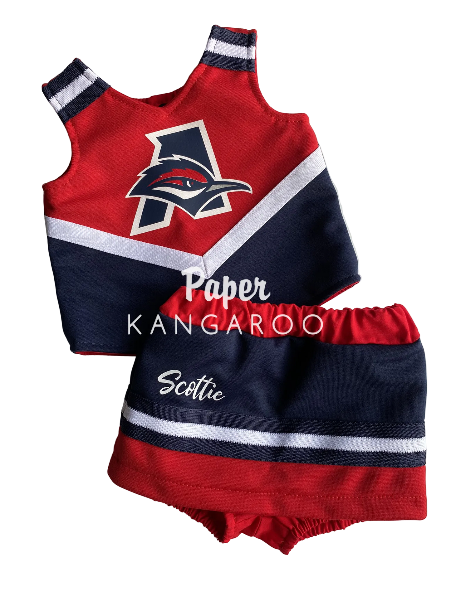 A red and navy blue custom baby cheerleader outfit set with a sleeveless top and matching shorts, laid flat on a light background. The top features a kangaroo logo, and the shorts are personalized with the name 'Scottie' in white script.