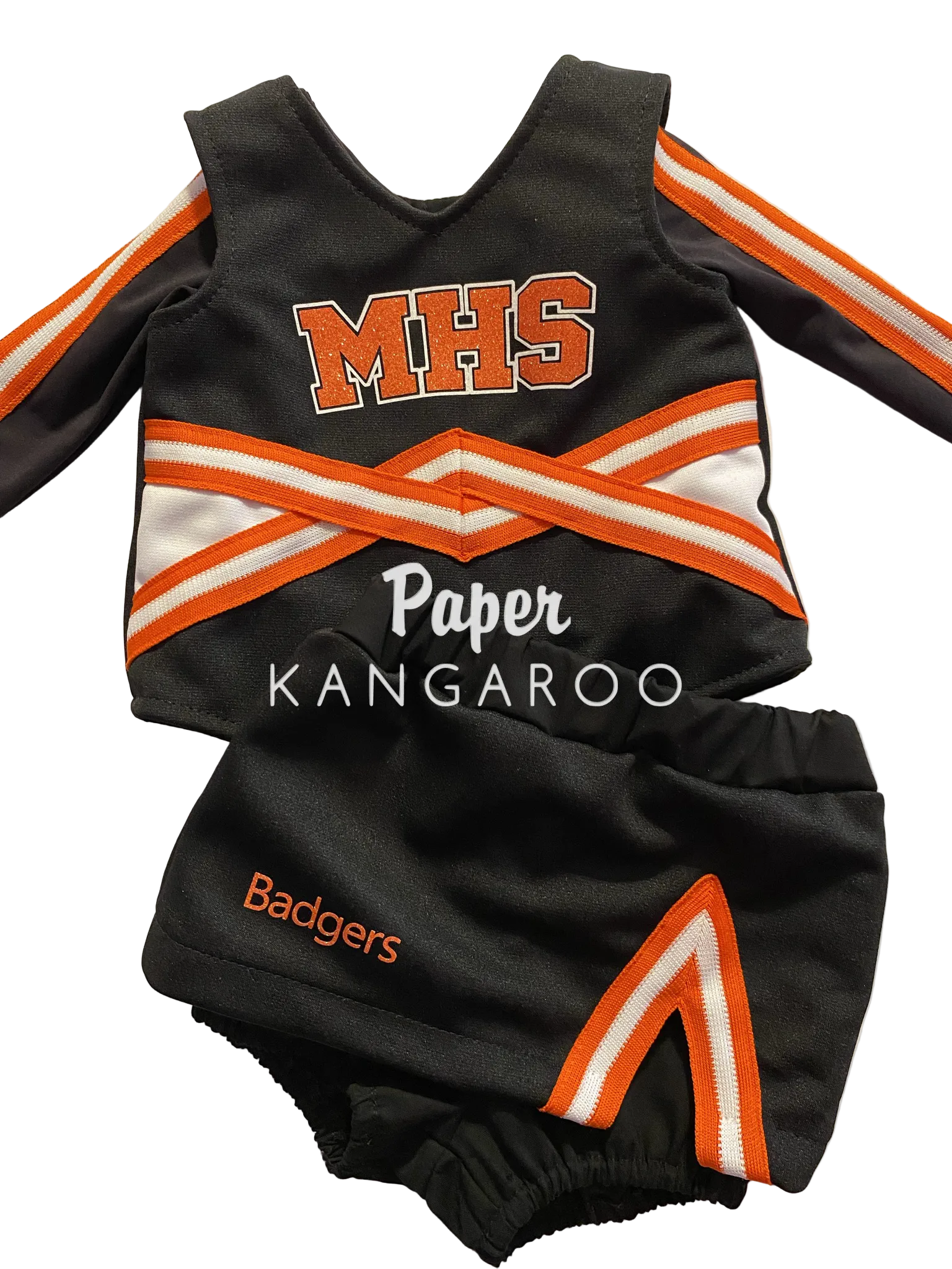 A black cheerleader-style two-piece outfit laid flat on a light background, with orange and white striped sleeve details, large orange 'MHS' lettering on the top, a white 'Paper KANGAROO' watermark across the center, and orange 'Badgers' text on the shorts.