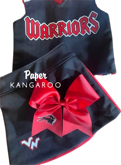 A black and red cheerleader outfit set featuring a sleeveless top with 'WARRIORS' in red and white, matching shorts with a large red bow and a bird logo, on a white background with a 'Paper Kangaroo' watermark.