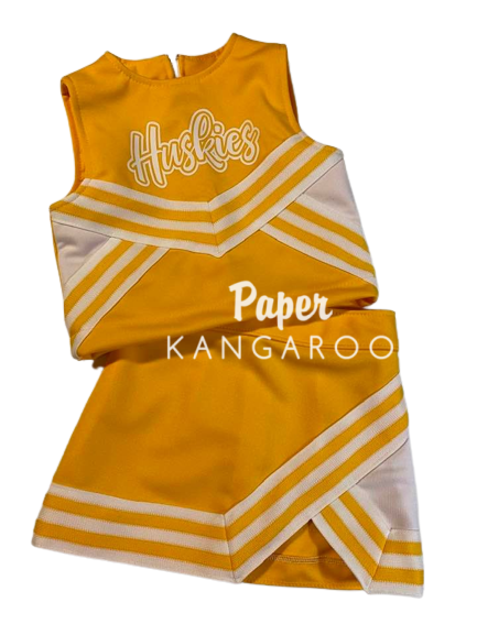 Gold and white Huskies cheer uniform set for toddler girls size 4T, featuring sleeveless top with script lettering and matching skirt — handmade by Paper Kangaroo